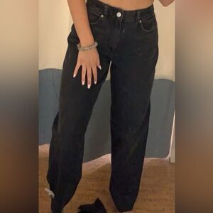 Garage baggy black Jean with a distressed hem